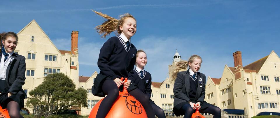 pivot academics UK top boarding school consultancy admission service Roedean school students playing outside the campus